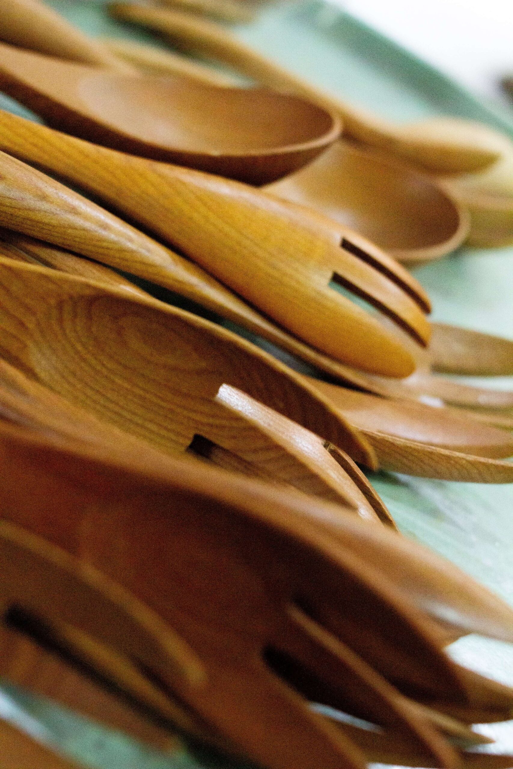 wooden forks, spoons and serving dishes